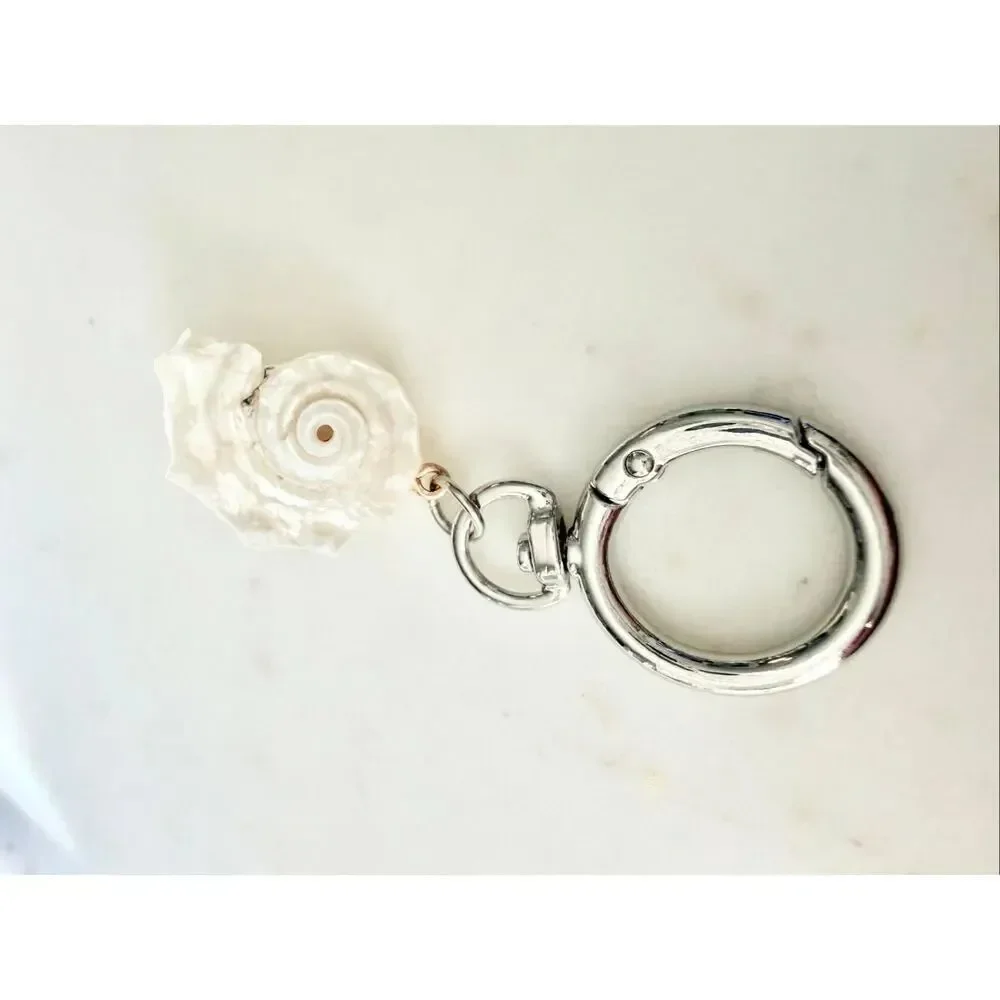 Pearlescent with silver color seashell keychain